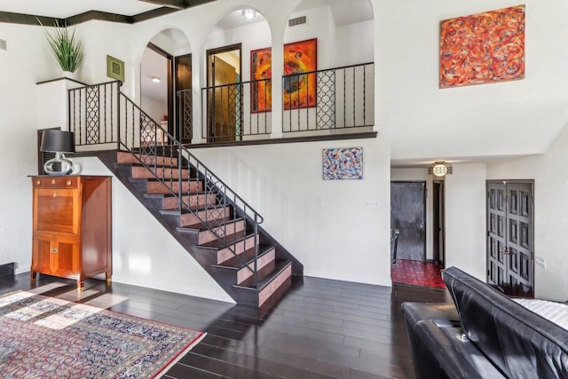 stairs with wood-type flooring