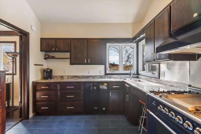 kitchen with black dishwasher, dark tile patterned floors, dark brown cabinets, and range with gas cooktop