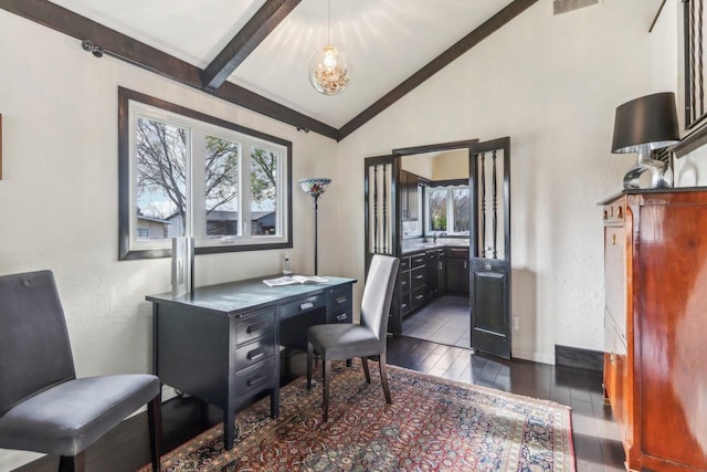 office space with vaulted ceiling with beams and dark hardwood / wood-style floors