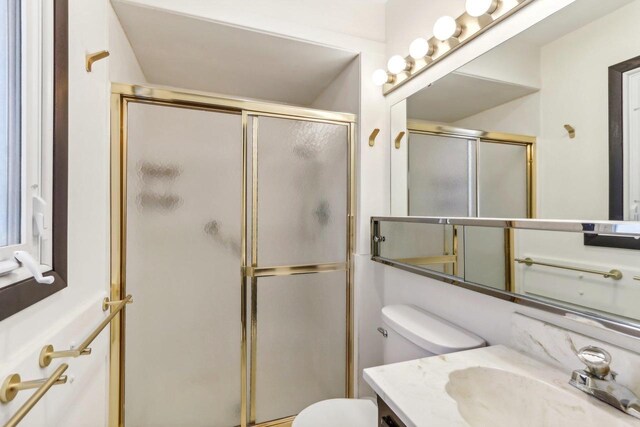 5302 Arapahoe Ln, Madison, WI 53704 - full bath featuring toilet, a shower stall, and vanity