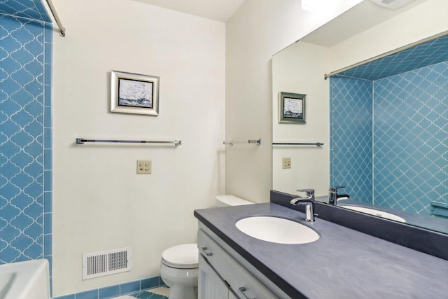5302 Arapahoe Ln, Madison, WI 53704 - bathroom with a bathtub, visible vents, a shower, vanity, and toilet