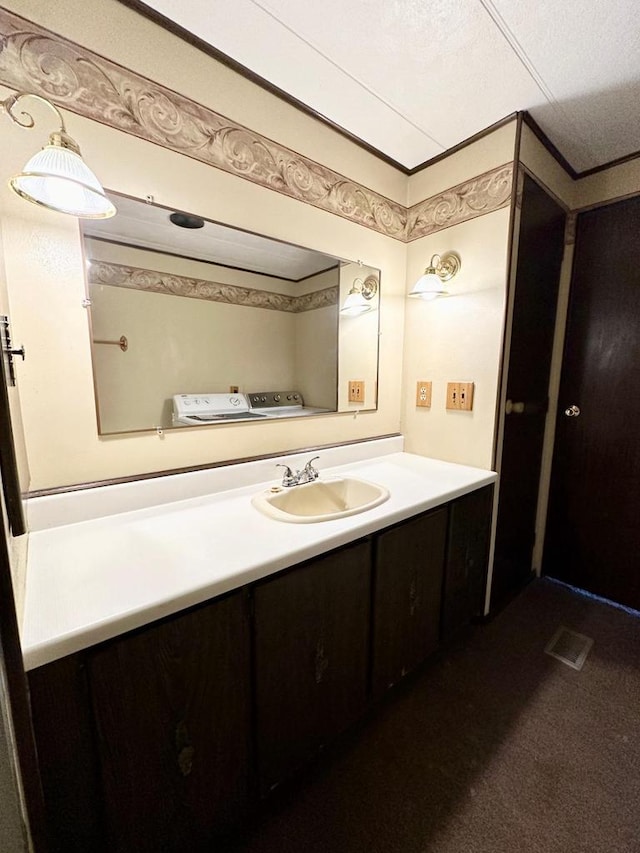 bathroom featuring vanity and a textured ceiling