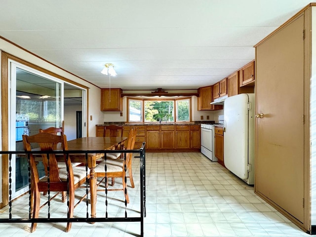 kitchen with white appliances and sink