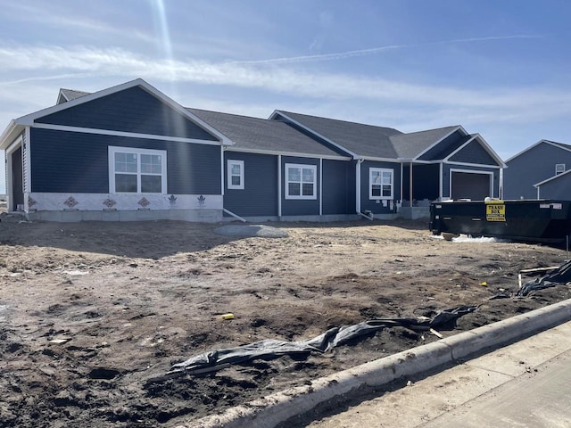 167 E Ash Ln, Milton, WI 53563 - unfinished property with a garage