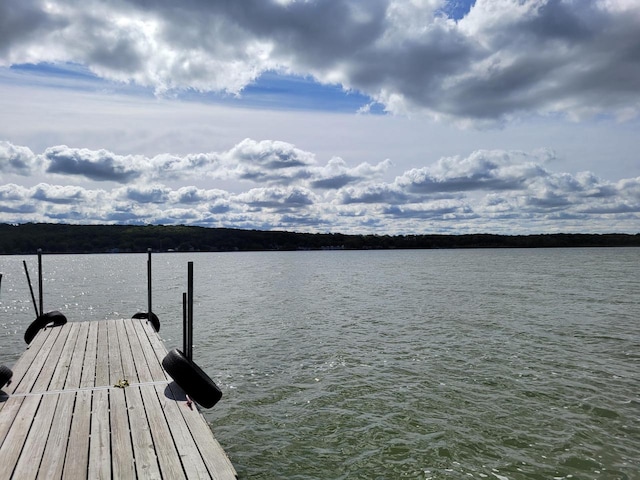 view of dock with a water view