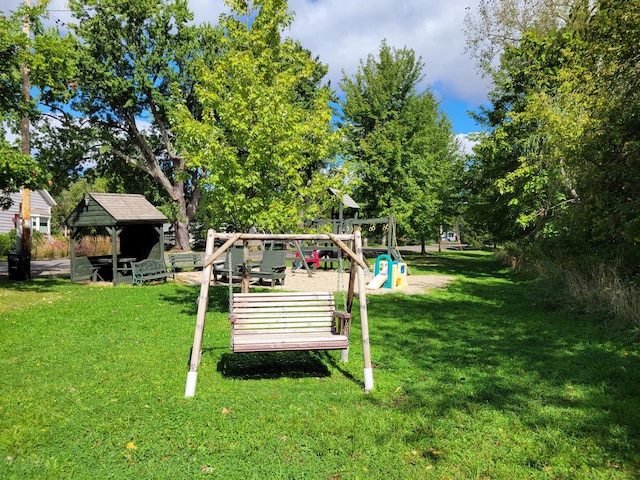 view of yard featuring a playground and a gazebo