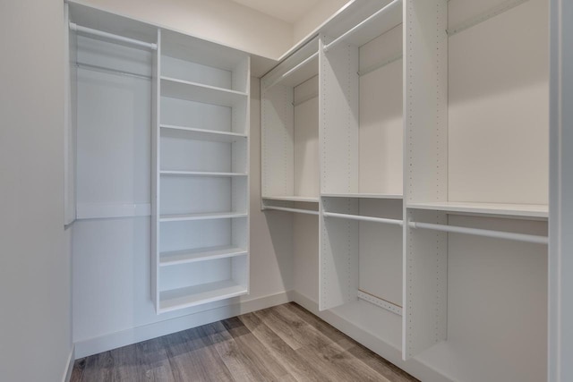 1295 Stonehaven Dr, Sun Prairie, WI 53590 - spacious closet with wood finished floors