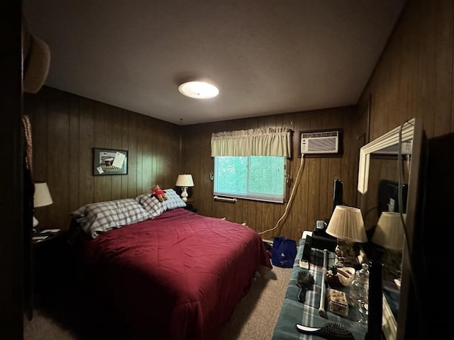 carpeted bedroom with wood walls and an AC wall unit