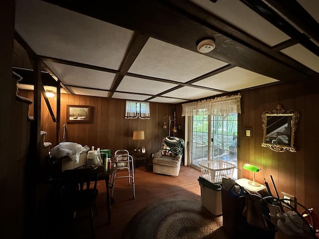 living room featuring wooden walls