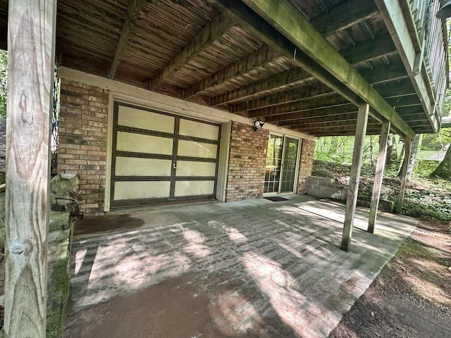 view of patio with a garage