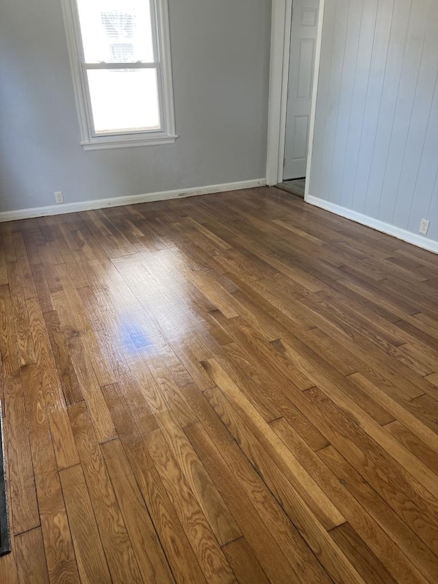 empty room featuring dark hardwood / wood-style floors