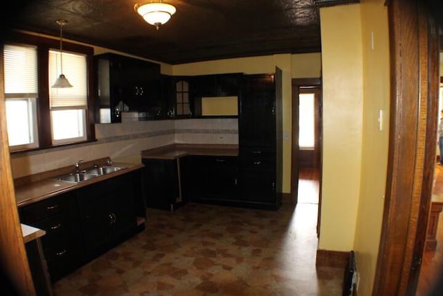 kitchen with hanging light fixtures and sink