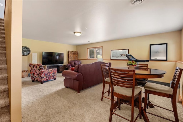 view of carpeted dining space