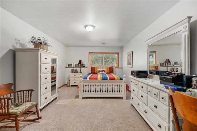 bedroom with light carpet