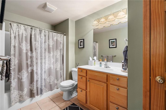 full bathroom featuring shower / bathtub combination with curtain, tile patterned flooring, vanity, and toilet