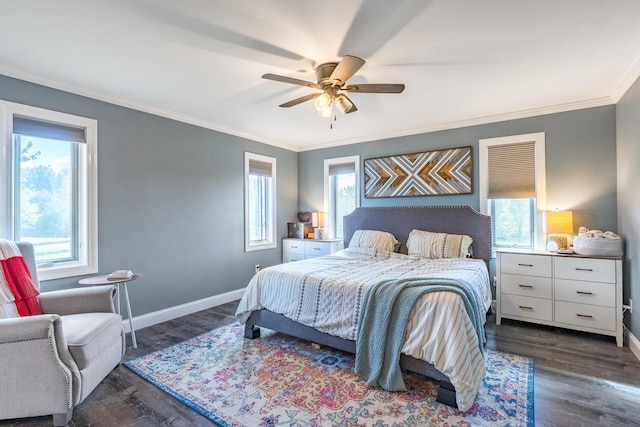 bedroom featuring multiple windows, crown molding, ceiling fan, and dark wood-type flooring