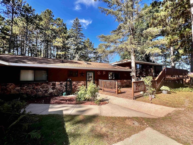 view of front of property featuring a deck