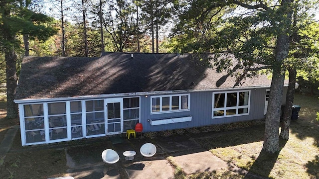 view of front facade featuring a sunroom