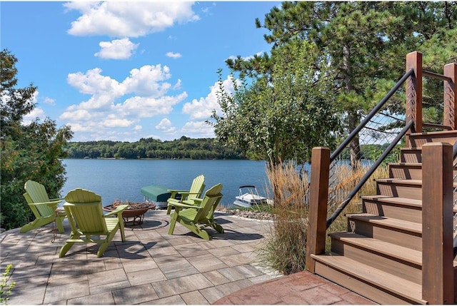 view of patio featuring a water view