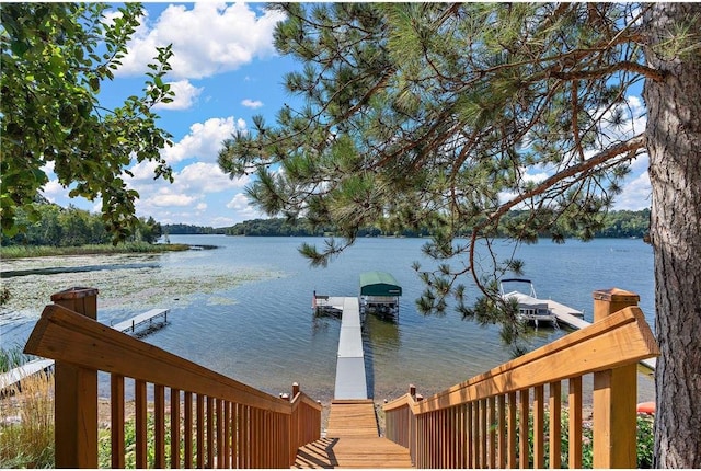 dock area featuring a water view