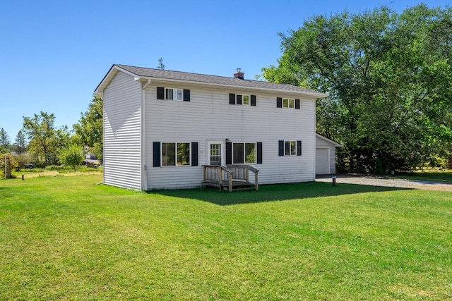 exterior space with a lawn and a garage