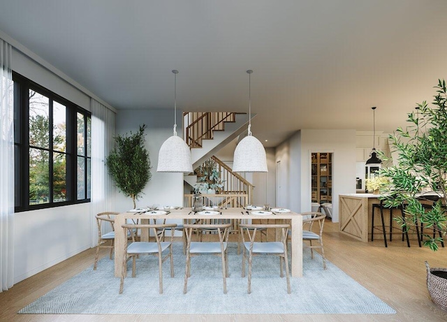 dining room featuring light hardwood / wood-style flooring