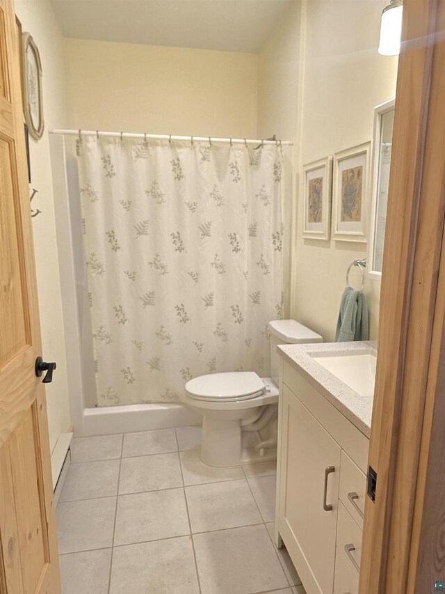 bathroom with tile patterned flooring, vanity, toilet, and a shower with shower curtain