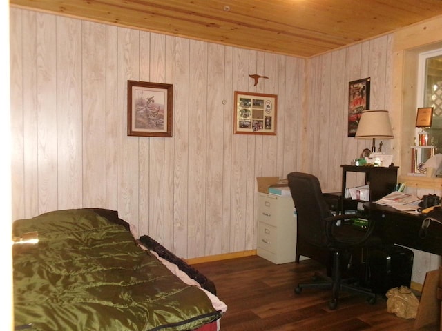 bedroom with wooden walls, dark hardwood / wood-style flooring, and wooden ceiling