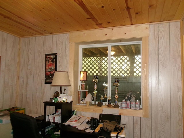 office space with wooden walls, wood ceiling, and plenty of natural light