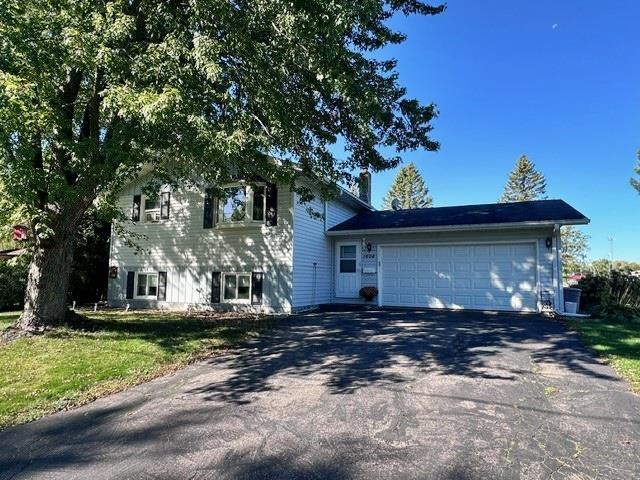 split level home with a garage