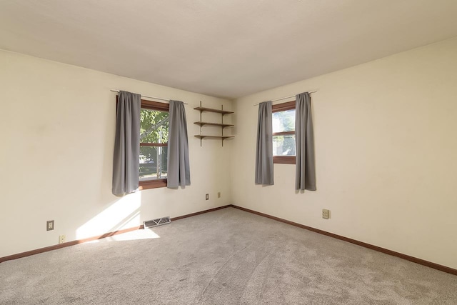 view of carpeted spare room