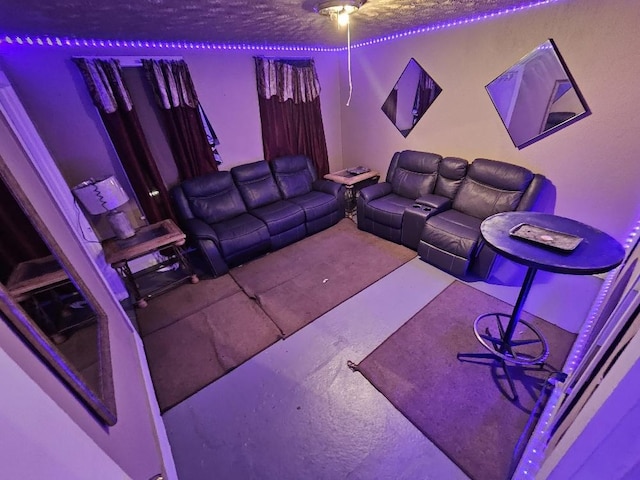 home theater featuring a textured ceiling