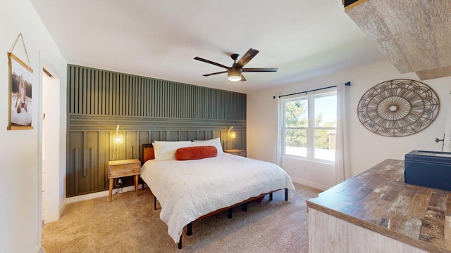 bedroom with ceiling fan and carpet floors