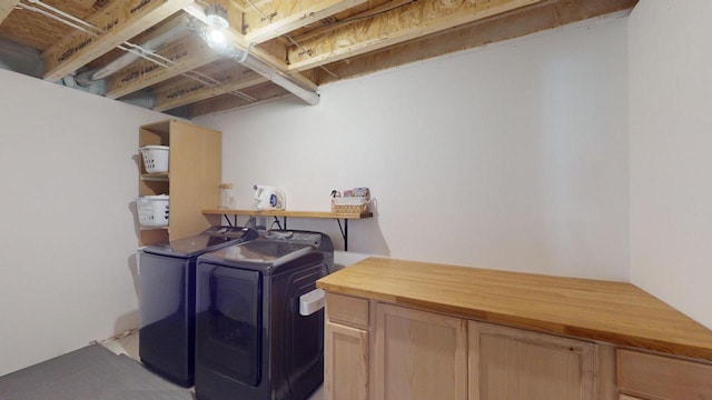 laundry area featuring independent washer and dryer