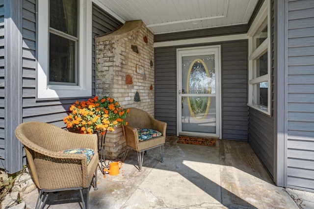 doorway to property with covered porch