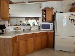 kitchen featuring white appliances