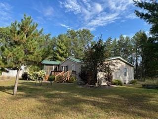 W4706 29th St, Necedah, WI 54646 - view of property exterior featuring a yard
