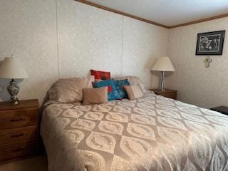 bedroom featuring ornamental molding