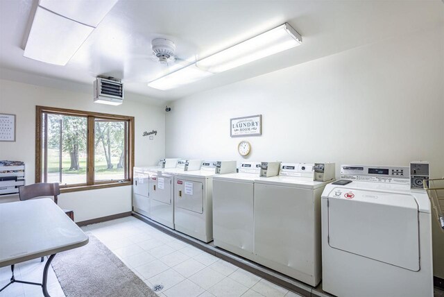 clothes washing area with ceiling fan and washer and clothes dryer