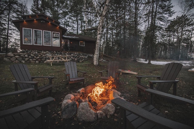 exterior space featuring a fire pit