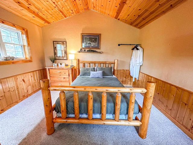 carpeted bedroom featuring wood walls, wood ceiling, and vaulted ceiling