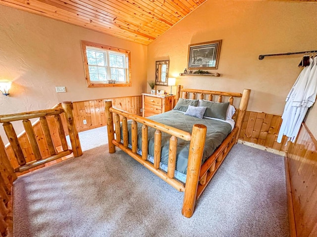 carpeted bedroom featuring wood ceiling, wooden walls, and vaulted ceiling