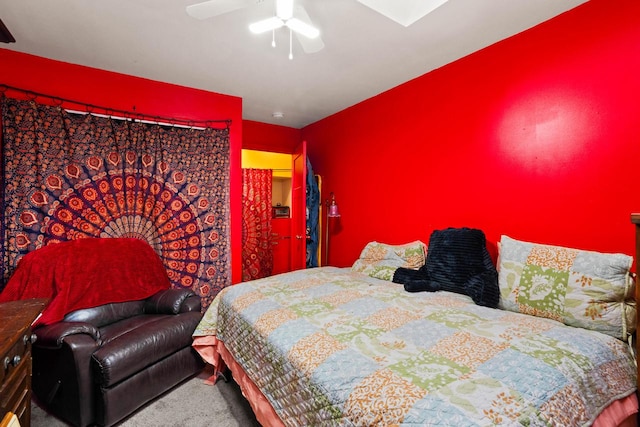 carpeted bedroom with ceiling fan