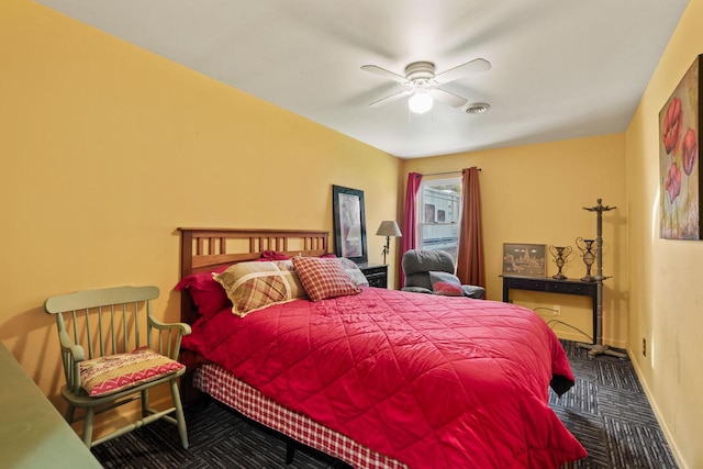 bedroom featuring ceiling fan and carpet floors