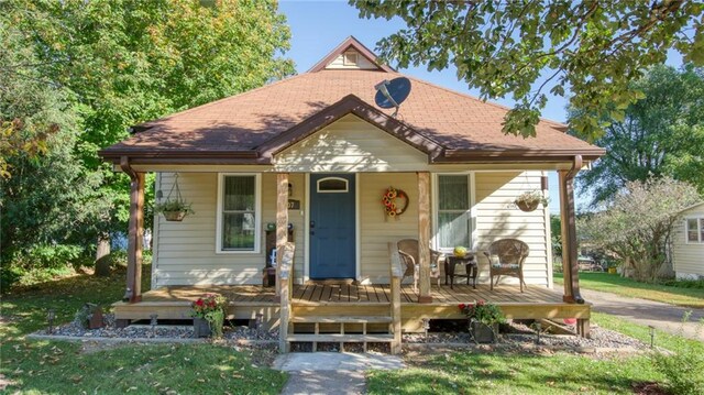 807 Miner Ave, Ladysmith, WI 54848 - bungalow-style home with a shingled roof and covered porch