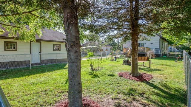 807 Miner Ave, Ladysmith, WI 54848 - view of yard with a fenced backyard and a wooden deck