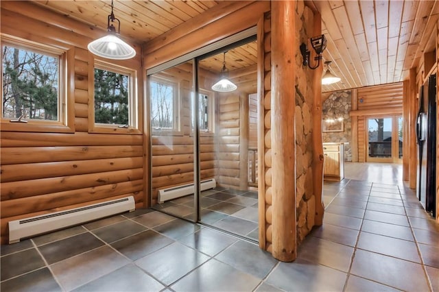 14665 W Buckeye Ln, Stone Lake, WI 54876 - hallway with wooden ceiling, baseboard heating, log walls, and tile patterned flooring