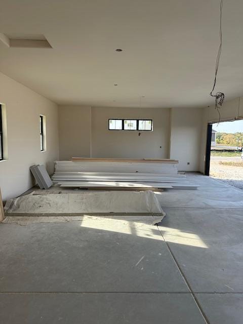 interior space featuring concrete flooring