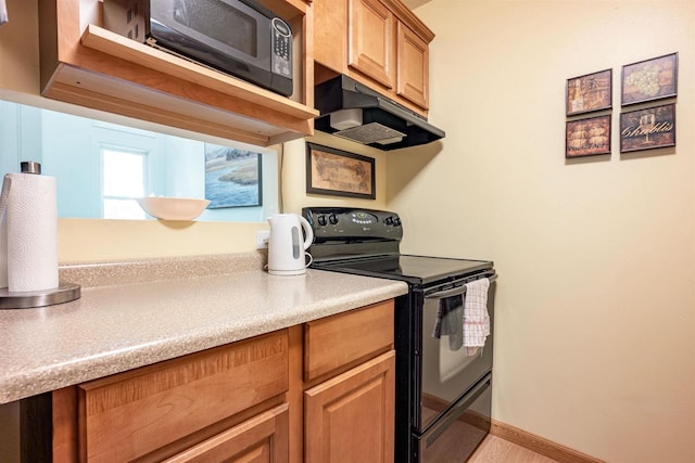 kitchen with black appliances