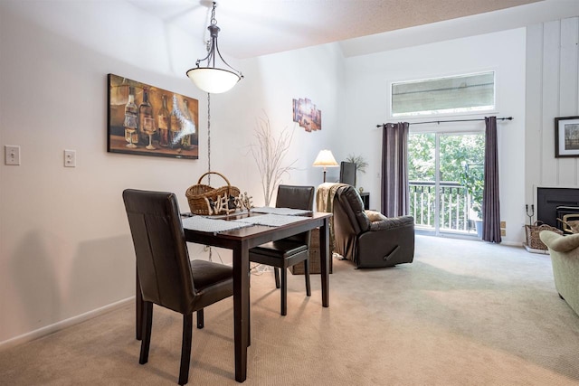 view of carpeted dining area